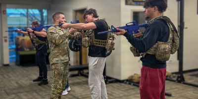 Sgt. 1st Class Joseph Mojica conducts weapons training