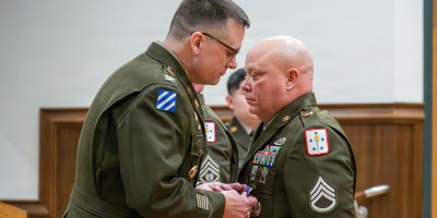 Soldier receives Purple Heart, credits training for skilled reaction to IED attack in Afghanistan