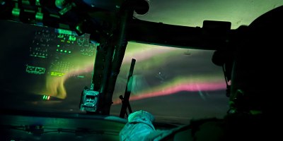 Alaska Army National Guardsmen conduct a nighttime medical evacuation mission
