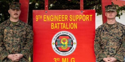 Two U.S Marines Assist a Local Japanese Resident During a Medical Emergency