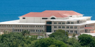 A view of the new U.S. Naval Hospital Guam. A ribbon-cutting ceremony was held to unveil the facility, which boasts 281,000 square feet, including 42 beds, two cesarean section rooms, improved diagnostic and ancillary capabilities such as MRI and CT scanning suites, and replaces the old facility built in 1954. (U.S. Navy photo by Jesse Leon Guerrero/Released)