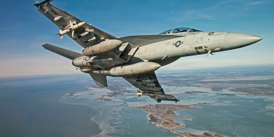 An F/A-18 conducts testing with the Small Diameter Bomb (SDB) II at Naval Air Station Patuxent River, Md. The SDB II variant includes an advanced tri-mode seeker, allowing it to engage dynamic targets in adverse conditions. (U.S. Navy photo)