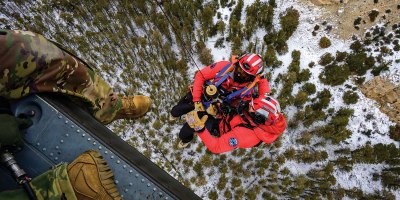 Wyoming Army Aviation teams and Big Horn County Serach and Rescue team perform hoist training