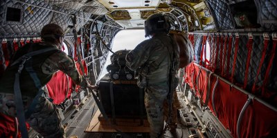 U.S. Soldiers assigned to 1st Special Forces Group (Airborne) load the Joint Precision Airdrop System at Joint Base Lewis-McChord, Washington, Feb. 12, 2026. JPADS is a self-steering, GPS and vision-guided airdrop platform consisting of a canopy and an autonomous guidance unit capable of landing within 100 meters of its target.