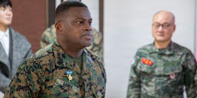 U.S. Marine Corps Sgt. Maj. Ismael G. Bamba, command senior enlisted leader of Marine Forces Korea, stands at attention as his citation is read during his award ceremony at Republic of Korea Marine Corps Headquarters at Camp Baran, South Korea, Feb. 3, 2026. The commendation highlights significant efforts supporting regional stability, alliance readiness and combined operational effectiveness on the Korean Peninsula. (U.S. Marine Corps photo by Gunnery Sgt. Antonio Campbell)