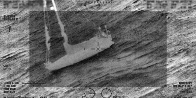 A Coast Guard Air Station Miami HC-144 Ocean Sentry aircrew works alongside the container ship Polar Mexico's crew to rescue a man aboard a disabled 34-foot sailing vessel, 35 miles off Cape Canaveral, Florida, Feb. 22, 2026. Coast Guard Sector Jacksonville command center watchstanders received a report stating a 34-foot sailing vessel was disabled approximately 33 miles offshore of Port Canaveral with one person aboard requesting assistance from commercial towing. (U.S. Coast Guard photo)