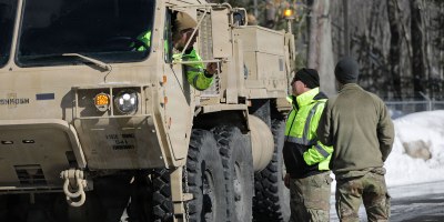 Soldiers of the 120th Regional Support Group, Maine Army National Guard, make final preparations at the armory in Sanford, Maine, before beginning their convoy to Rhode Island Feb. 26. The Maine National Guard mobilized to assist the State of Rhode Island following a significant winter storm that brought heavy snowfall and widespread impacts to the region. The primary mission will be to haul snow from critical infrastructure areas, roadways, and public spaces and help Rhode Island agencies expedite recovery efforts and restore normal operations throughout the City of Providence.
