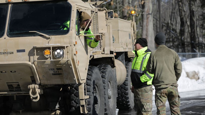 Soldiers of the 120th Regional Support Group, Maine Army National Guard, make final preparations at the armory in Sanford, Maine, before beginning their convoy to Rhode Island Feb. 26. The Maine National Guard mobilized to assist the State of Rhode Island following a significant winter storm that brought heavy snowfall and widespread impacts to the region. The primary mission will be to haul snow from critical infrastructure areas, roadways, and public spaces and help Rhode Island agencies expedite recovery efforts and restore normal operations throughout the City of Providence.