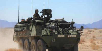 U.S. Soldiers assigned to 1st Battalion, 112 Infantry Regiment, 56th Stryker Brigade Combat Team, 28th Infantry Division (PA ARNG) conduct convoy operations utilizing Stryker Armored Vehicles during Decisive Action Rotation 22-08 at the National Training Center, Fort Irwin, Calif., June 26, 2022. Rotations at the National Training Center ensure Army Brigade Combat Teams remain versatile, responsive, and consistently available for current and future contingencies. (U.S. Army photo by Spc. Aaron Walker, operations Group, National Training Center)