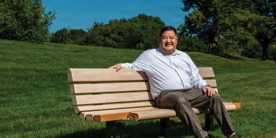 David Lin, 60th Civil Engineer Squadron deputy base civil engineer, sits outdoors at Travis Air Force Base, California, March 25, 2026. Lin received a lifesaving kidney transplant in December 2025, facilitated by his close friend Amy Larson, enabling him to return to duty as a member of Team Travis. (U.S.) Air Force Photo by Gary Edwards)