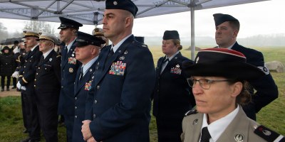 U.S. Airmen with the 102nd Intelligence Wing attend a memorial plaque unveiling in Dogneville, France, Feb. 16, 2026. The ceremony honored U.S. Army Air Forces Master Sgt. Thomas Virnelli, who was killed in an aircraft crash nearby in 1945.