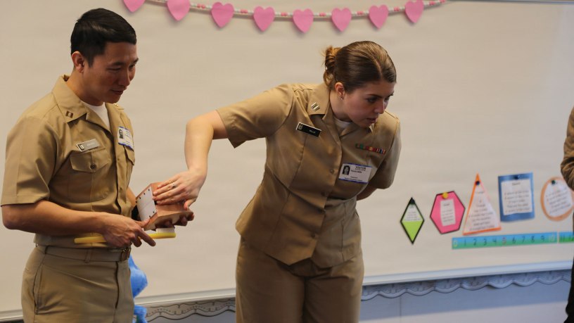 Dentists and hygienists from Naval Health Clinic Lemoore visited two elementary schools on Naval Air Station Lemoore to teach children the importance of dental hygiene. Lt. Hannah Mills, Lt. Tri Nguyen, Lt. Dikran Diarian and dental hygienist Brenda Guerzon presented oral health education to students from preschool through third grade at Neutra Elementary School on Feb. 25 and Akers School on Feb. 27.