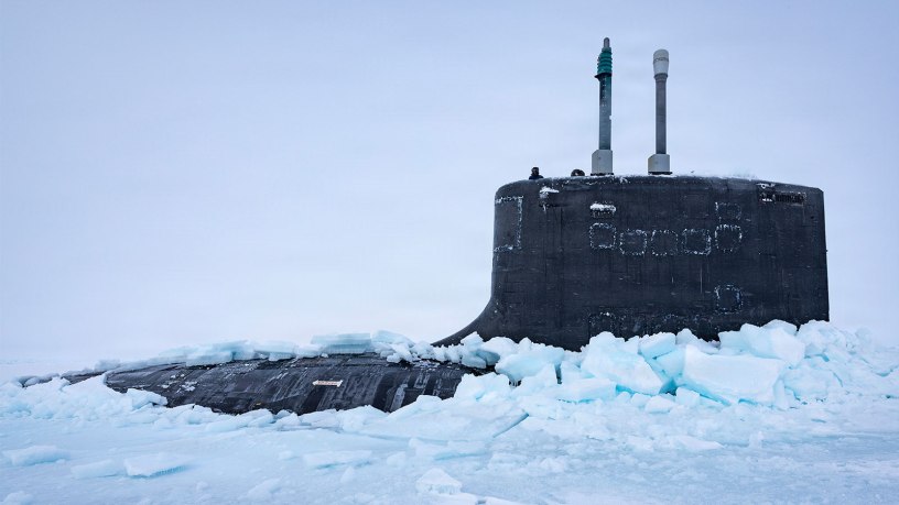 Virginia-class fast-attack submarine USS Delaware (SSN 791) emerges from the ice after performing a vertical surfacing to kick off Operaetion ICE CAMP 2026, Mar. 7. ICE CAMP Boarfish is a three-week operation designed to research, test, and evaluate operational capabilities in the Arctic region.