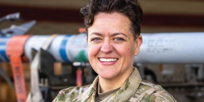 Senior Airman Alisha Sargent poses for a photo in the weapons hangar at Portland Air National Guard Base, Portland, Ore., March 8, 2026. Sargent returned to service after a medical discharge that nearly ended her dream of serving. (U.S. Air National Guard photo by Senior Airman Eduardo Figueroa Varela)