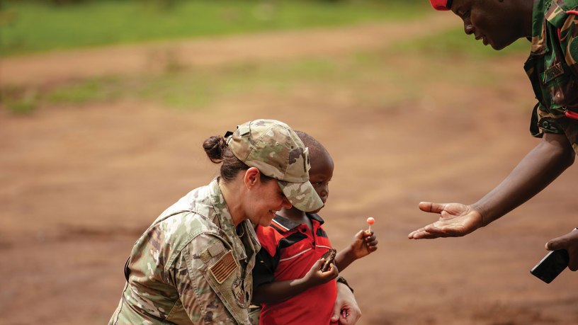 U.S. Air Force Lt. Col. Angela Ling, the lead medical readiness exercise planner for Justified Accord 26 with the 155th Medical Group, 155th Air Refueling Wing, Nebraska Air National Guard, introduces herself to a Tanzanian patient as part of a medical readiness exercise during JA26 at Msata Military Training Base in Msata, Tanzania, March 9, 2026.