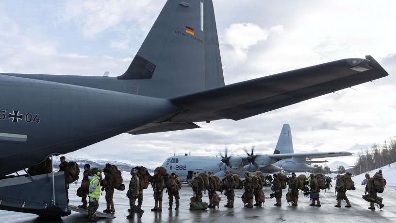 U.S. Marines with 2nd Battalion, 6th Marine Regiment, 2nd Marine Division, board a C-130 aircraft with the German-French Binational Air Transport Squadron (BATS) at Bardufoss Airport, Norway, March 11, 2026.