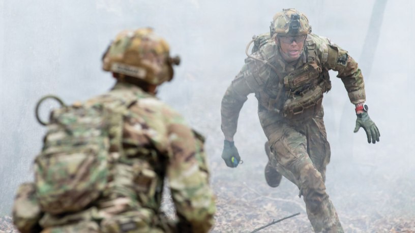 U.S. Air Force Tech Sgt. Chandler Durden, a security forces specialist, representing the Savannah-based 165th Airlift Wing, Georgia Air National Guard, sprints forward on the testing lane during the Hand Grenade Course event of the 2026 Georgia Army National Guard State Best Warrior Competition, Mar. 11, 2026, at the Catoosa Volunteer Training Site, Ringgold, Georgia.