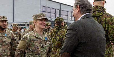 Roman Pipko, the U.S. Ambassador to Estonia, speaks to a U.S. Soldier assigned to the 102nd Military Police Company, during an award ceremony in Estonia on March 12, 2026. The ceremony presented Soldiers with the NATO Kaitsel “Defender” medal, awarded by the Estonian Ministry of Defense and the Estonian Defense League. The medal recognizes the contributions of U.S. and NATO forces in strengthening warfighting capabilities on NATO’s eastern flank. (U.S. Army photo by Pfc. Gabriel Martinez)