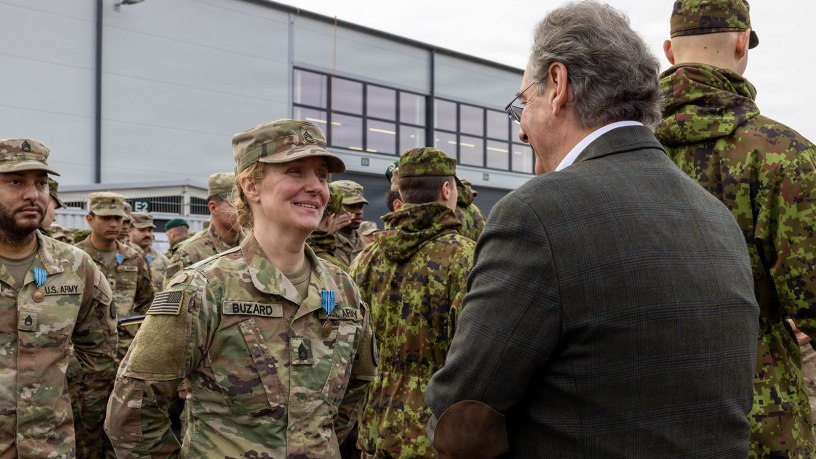 Roman Pipko, the U.S. Ambassador to Estonia, speaks to a U.S. Soldier assigned to the 102nd Military Police Company, during an award ceremony in Estonia on March 12, 2026. The ceremony presented Soldiers with the NATO Kaitsel “Defender” medal, awarded by the Estonian Ministry of Defense and the Estonian Defense League. The medal recognizes the contributions of U.S. and NATO forces in strengthening warfighting capabilities on NATO’s eastern flank. (U.S. Army photo by Pfc. Gabriel Martinez)