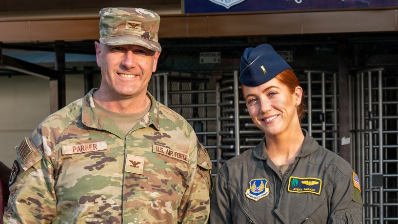 U.S. Air Force Col. William Parker, United States Forces Korea J1 assistant chief of staff, and 2nd Lt. Avery Parker, 607 Air Operations Center combat operations division flight test engineer augmentee, pose for a photo at Osan Air Base, Republic of Korea, March 17, 2026. The Parker family’s connection to Korea spans three generations, including William Parker’s father who flew missions along the Demilitarized Zone as a reconnaissance navigator during the Cold War Era. (U.S. Air Force photo by Staff Sgt. Evan Porter)