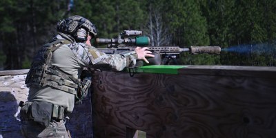 A competitor in the 17th Annual United States Army Special Operations Command International Sniper Competition shoots a rifle at multiple long-distance targets on a range at Fort Bragg, North Carolina, March 18, 2026.