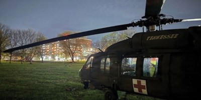Tennessee Army National Guard UH-60 Blackhawk helicopter lands at Chattanooga’s Lincoln Park, next to Erlanger Baroness Hospital, where an injured hiker suffering severe lower extremity injuries following a rockslide near Signal Mountain was transferred to an awaiting ambulance and taken to the hospital emergency room, March 21.