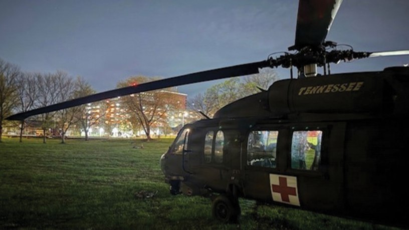 Tennessee Army National Guard UH-60 Blackhawk helicopter lands at Chattanooga’s Lincoln Park, next to Erlanger Baroness Hospital, where an injured hiker suffering severe lower extremity injuries following a rockslide near Signal Mountain was transferred to an awaiting ambulance and taken to the hospital emergency room, March 21.
