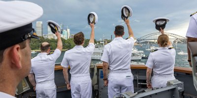 U.S. Navy Sailors assigned to Arleigh Burke-class guided-missile destroyer USS Fitzgerald (DDG 62) render honors to the Leeuwin-class survey ship HMAS Leeuwin (A 245) during a fleet review as a part of Exercise Kakadu in Sydney, March 21, 2026.