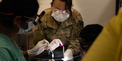 U.S. Army Sgt. Miriam Hernandez, assigned to Joint Task Force-Bravo, assists during a cavity at Guillermo Sanchez Hospital, Panama, March 23, 2026. The mission was designed to improve access to healthcare while strengthening partnerships between U.S. forces and Panama. (U.S. Army photo by Spc. Trey Woodard)