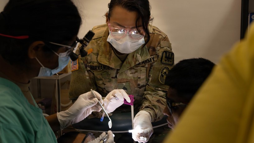 U.S. Army Sgt. Miriam Hernandez, assigned to Joint Task Force-Bravo, assists during a cavity at Guillermo Sanchez Hospital, Panama, March 23, 2026. The mission was designed to improve access to healthcare while strengthening partnerships between U.S. forces and Panama. (U.S. Army photo by Spc. Trey Woodard)