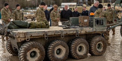 Soldiers of the Lethal Unmanned Systems Platoon, Strike Company, 2nd Battalion, 2nd Infantry Regiment, 3rd Brigade, 10th Mountain Division, speak to Army civilians from the U.S. Army Program Executive Office Combat Support & Combat Service Support about the Small Multipurpose Equipment Transport before Exercise Combined Resolve 25-1 at the Joint Multinational Readiness Center on Hohenfels Training Area, Germany, Jan. 24, 2025.