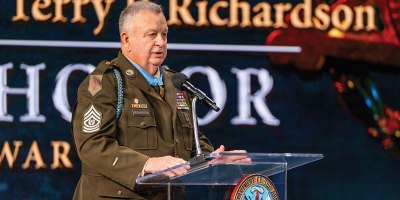 Retired U.S. Army Command Sgt. Maj. Terry P. Richardson speaks during a Hall of Heroes Induction Ceremony at Conmy Hall, Joint Base Myer-Henderson Hall, Virginia, March 3, 2026, honoring three Army Medal of Honor recipients for their acts of conspicuous gallantry and intrepidity at the risk of their lives above and beyond the call of duty. Richardson received the award for his actions Sept. 14, 1968, while he was a Staff Sgt. serving as the Lima Platoon Leader with Company A, 1st Battalion, 28th Infantry Regiment, 1st Infantry Division during action in the vicinity of Loc Ninh, Republic of Vietnam. (U.S. Army photo by Bernardo Fuller)