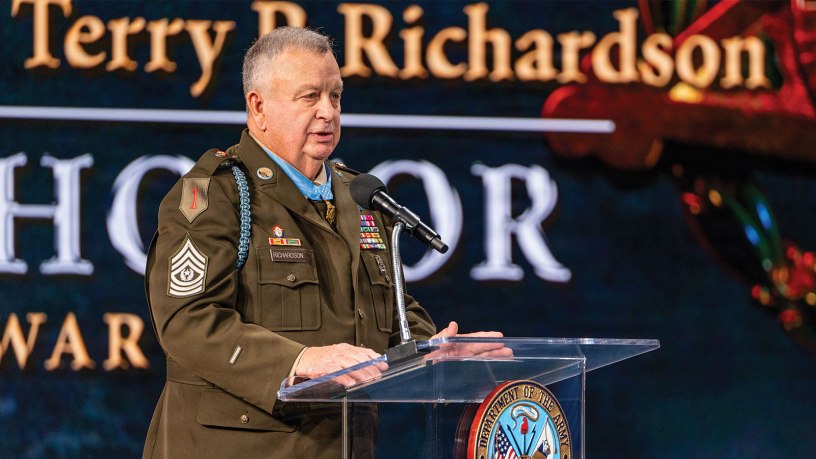 Retired U.S. Army Command Sgt. Maj. Terry P. Richardson speaks during a Hall of Heroes Induction Ceremony at Conmy Hall, Joint Base Myer-Henderson Hall, Virginia, March 3, 2026, honoring three Army Medal of Honor recipients for their acts of conspicuous gallantry and intrepidity at the risk of their lives above and beyond the call of duty. Richardson received the award for his actions Sept. 14, 1968, while he was a Staff Sgt. serving as the Lima Platoon Leader with Company A, 1st Battalion, 28th Infantry Regiment, 1st Infantry Division during action in the vicinity of Loc Ninh, Republic of Vietnam. (U.S. Army photo by Bernardo Fuller)