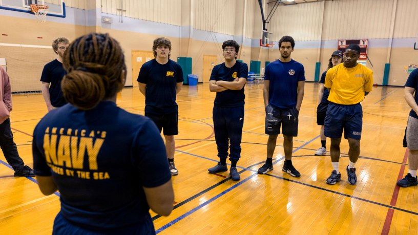 Logistics Specialist 1st Class Shadijah Copeland, left, a recruiter assigned to Navy Talent Acquisition Group Pittsburgh (NTAG Pittsburgh), speaks to future Sailors during a Delayed Entry Program meeting, Blair Regional YMCA, March 12, 2026. NTAG Pittsburgh, part of Navy Recruiting Command, recruits the next generation of Navy Sailors throughout areas in Pennsylvania, New York, West Virginia, and Maryland. (U.S. Navy photo by Mass Communication Specialist 1st Class Robert Stamer.)