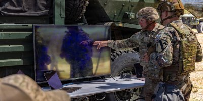 Chief Warrant Officer 2 Trenton Huntsinger, the air missile integrator for 1st Cavalry Division Artillery, 1st Cavalry Division, demonstrates the Picogrid Unmanned Aircraft System integration system to Col. Nick Dvonch, the 1st cavalry Division Artillery commander, during Condor Rebirth on Fort Hood, Texas, March 24, 2026. Operation Condor Rebirth allowed capability providers to test new equipment, collaborate across teams, and integrate with the 1st Cavalry Division during a field exercise simulating real-world battlefield conditions. (U.S. Army photo by Spc. Julian A. Winston)