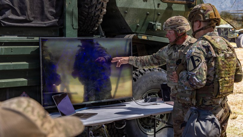 Chief Warrant Officer 2 Trenton Huntsinger, the air missile integrator for 1st Cavalry Division Artillery, 1st Cavalry Division, demonstrates the Picogrid Unmanned Aircraft System integration system to Col. Nick Dvonch, the 1st cavalry Division Artillery commander, during Condor Rebirth on Fort Hood, Texas, March 24, 2026. Operation Condor Rebirth allowed capability providers to test new equipment, collaborate across teams, and integrate with the 1st Cavalry Division during a field exercise simulating real-world battlefield conditions. (U.S. Army photo by Spc. Julian A. Winston)