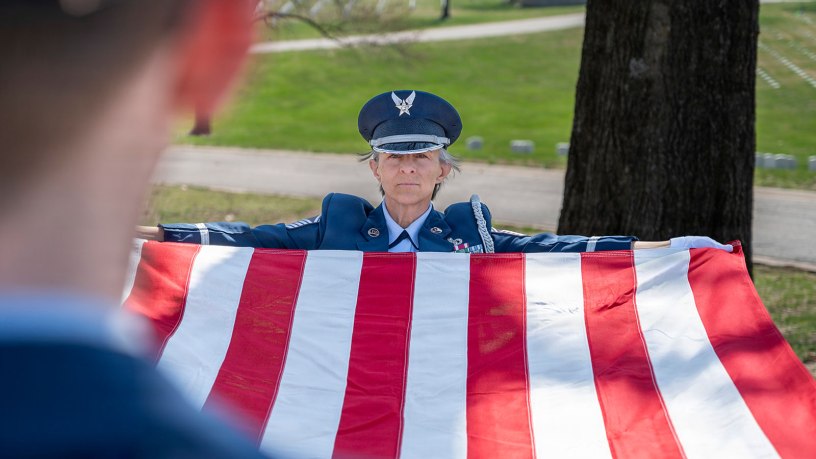 U.S. Air Force Senior Master Sgt. Karen Mitchell, member of the Missouri Military Funeral Honors Program, Missouri Air National Guard, prepares to fold a ceremonial flag, March 26, 2026, in St. Louis. Mitchell has served 42 years in the Missouri Air National Guard. (U.S. Air National Guard photo by Master Sgt. Stephanie Mundwiller)