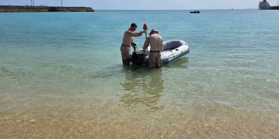 Marines assigned to the III Expeditionary Operations Training Group, III Marine Expeditionary Force, test custom built unmanned surface vessels at Naval Base White Beach, Okinawa, Japan, March 9, 2026. The systems were evaluated by employing onboard communication systems on rubber rafts in varying sea states by analyzing different haul types and designs.