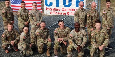 U.S. Army Reserve Soldiers competing in the U.S. Army Reserve Command’s Interallied Confederation of Reserve Officers (CIOR) selection competition, pose for a group photo at the NATO obstacle course at Joint Base McGuire-Dix-Lakehurst, N.J., April 1, 2026.