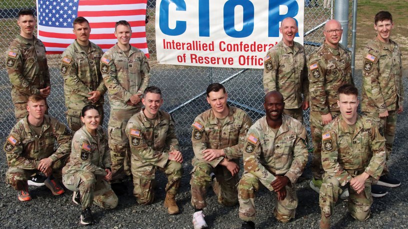 U.S. Army Reserve Soldiers competing in the U.S. Army Reserve Command’s Interallied Confederation of Reserve Officers (CIOR) selection competition, pose for a group photo at the NATO obstacle course at Joint Base McGuire-Dix-Lakehurst, N.J., April 1, 2026.