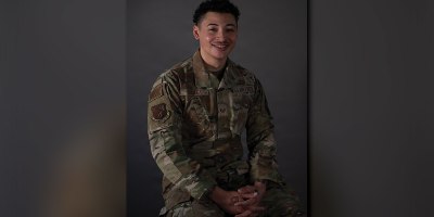 U.S. Air Force Staff Sgt. Theodore Dudley, 603rd Air Operations Center intelligence, surveillance, and reconnaissance assessments technician, poses for a photo at Ramstein Air Base, Germany, April 2, 2026. Dudley has been recognized as the 2026 USO Airman of the Year for saving 14 lives by guiding children, several families and five elderly people to safety during an apartment fire. (U.S. Air Force photo by Tech. Sgt. Alexandra M. Longfellow)