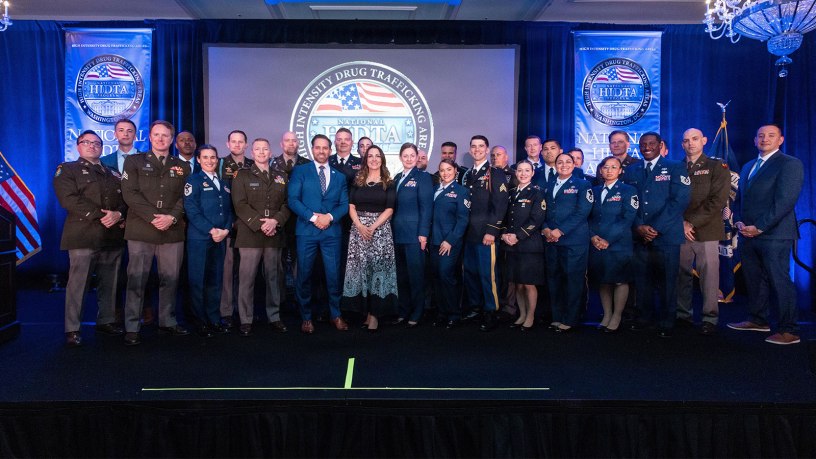 National Guard members stand alongside law enforcement and community partners during the High Intensity Drug Trafficking Area national awards ceremony hosted by the White House Office of National Drug Control Policy, April 2, 2026. The ceremony recognized 10 award-winning investigations supported by federal, state, local and tribal agencies, working to disrupt drug-trafficking networks across the United States.
