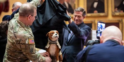 U.S. Sen. Richard Blumenthal and Maj. Gen. Francis J. Evon Jr., the adjutant general of the Connecticut National Guard, unveil a statue of Sgt. Stubby during a ceremony at the Connecticut State Library in Hartford, Connecticut, April 20, 2026. The unveiling marked the 100th anniversary of the death of Stubby, a stray dog adopted by Cpl. J. Robert Conroy in 1917 who went on to serve with the 102nd Infantry Regiment. (U.S. Army National Guard photo by Spc. Emmanuel Gibson)