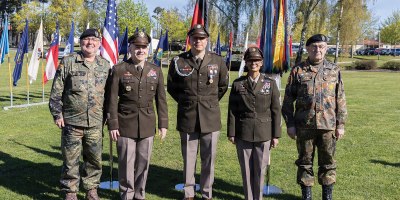 U.S. Army Maj. Gen. Michael Lalor, commanding general of the 21st Theater Sustainment Command, Command Sgt. Maj. Denice Malave, senior enlisted advisor of the 21st TSC, Sgt. Daniel T. Beltran, a bridge crewmember assigned to the 809th Multi-Role Bridge Company, 7th Engineer Brigade, and German military leaders pose for a photo following a Soldier’s Medal ceremony at Tower Barracks, Grafenwoehr, Germany, April 24, 2026.