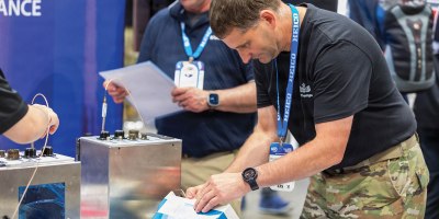 Staff Sgt. Michael Thompson, 1st Battalion, 210th Aviation Regiment, 128th Aviation Brigade, performs a wire diagnostic test during the MRO Americas Aerospace Maintenance Competition. Thompson competed as a member of Team Blackhawk, which secured first place in the military category of the international event. (Contributed photo)