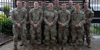 U.S. Soldiers with the Nebraska and North Dakota National Guards, assigned to Joint Task Force-District of Columbia in support of the DC Safe and Beautiful mission, pose for a group photo at a hotel in Alexandria, Virginia, April 28, 2026. About 2,500 National Guard members are supporting the mission, providing critical assistance to the Metropolitan Police Department to help ensure the safety of residents, commuters and visitors throughout the District. (U.S. Army National Guard photo by Staff Sgt. Thomas Norris)