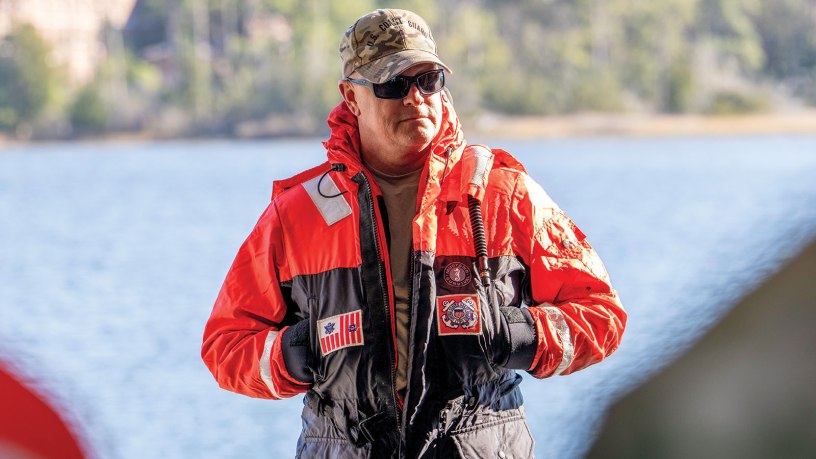 Chief Warrant Officer James Meadows, DDE-Boat Ops advisor at SMTC, observes operational brief to U.S. Coast Guard District 5 Command at Special Missions Training Center, Camp Lejeune, December 12, 2024. (U.S. Coast Guard photo by Petty Officer 2nd Class Crystal Burgess)