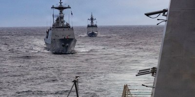 The Republic of Korea (ROK) Navy Chungmugong Yi Sun-sin-class destroyer ROKS Wang Geon (DDG 978), left, and Daegu-class frigate ROKS Daejeon (FFG 823), right, sail in formation aft of Arleigh Burke-class guided-missile destroyer USS Dewey (DDG 105) during the Maritime Counter Special Operations Exercise (MCSOFEX) with the ROK Navy, Nov. 18, 2025.
