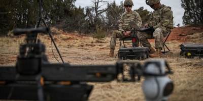 Pfc. Grant Wolfe (left) and Sgt. 1st Class Isaac Khamlanokaew, Tactical Unmanned Aircraft Systems (TUAS) Operators, both assigned to 4th Squadron, 10th Cavalry Regiment, 3rd Armored Brigade Combat Team, 4th Infantry Division, use the Lattice system during Ivy Sting 4 on Fort Carson, Colorado, Feb. 2, 2026. During Ivy Sting 4, Lattice integrated into Next Generation Command and Control to fuse sensor data and enhance mission command across maneuver formations. (U.S. Army photo by Pfc. Thomas Nguyen)