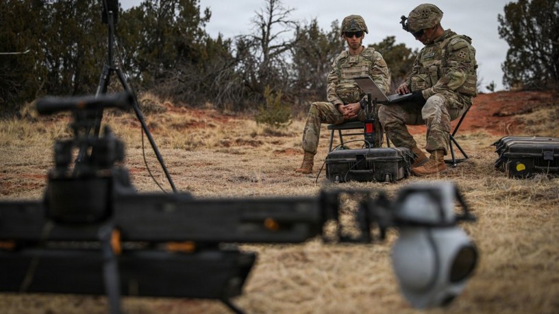 Pfc. Grant Wolfe (left) and Sgt. 1st Class Isaac Khamlanokaew, Tactical Unmanned Aircraft Systems (TUAS) Operators, both assigned to 4th Squadron, 10th Cavalry Regiment, 3rd Armored Brigade Combat Team, 4th Infantry Division, use the Lattice system during Ivy Sting 4 on Fort Carson, Colorado, Feb. 2, 2026. During Ivy Sting 4, Lattice integrated into Next Generation Command and Control to fuse sensor data and enhance mission command across maneuver formations. (U.S. Army photo by Pfc. Thomas Nguyen)